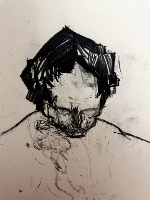 A rough charcoal or graphite sketch of a man with dark hair, looking downward with his hand near his face, rendered in expressive, sketchy strokes.