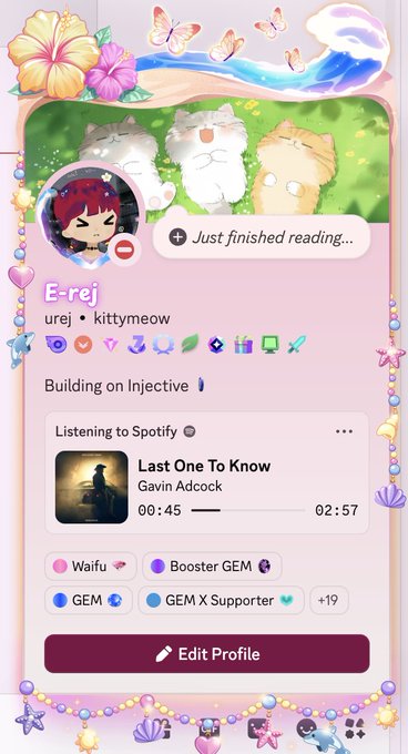 A colorful, decorative profile page for user 'E-rej' (urej • kittymeow) showing the status 'Just finished reading...', currently 'Listening to Spotify' on 'Last One To Know' by Gavin Adcock, with badges including Waifu, Booster GEM, and GEM X Supporter.