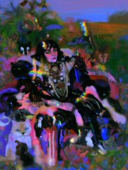 A blurry, colorful image shows people riding horses in what appears to be an outdoor equestrian setting.