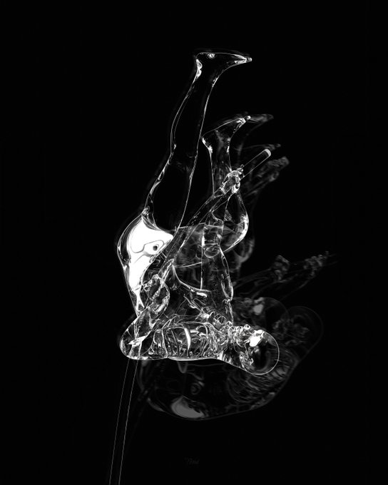 A black and white artistic photograph showing fluid, glass-like shapes suspended against a dark background, creating a sculptural, abstract form.