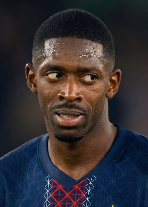 A close-up photo shows a sweat-drenched soccer player wearing a dark blue France national team jersey, looking off to the side during a match. The image relates to the post as it likely depicts a PSG star, connecting to the news that a bettor wagered $110,000 against PSG winning their Ligue 1 opener against Rennes.