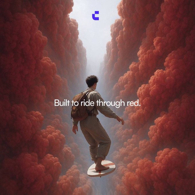 A surreal advertisement featuring a person in vintage clothing surfing on a surfboard between walls of red clouds/smoke, with the text 'Built to ride through red.' and a logo at the top.