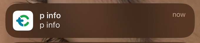 A mobile notification from the Tokocrypto app displays the message 'p info' twice on a dark translucent banner.