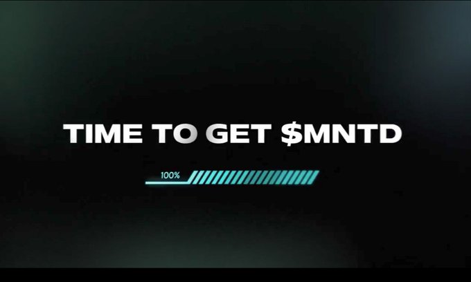 A dark screen with the text 'TIME TO GET $MNTD' displayed above a loading bar filled to 100%.