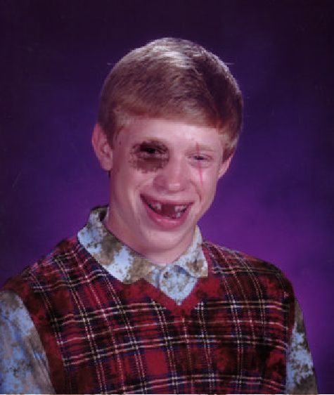 A young boy with red hair poses for a school portrait, smiling widely to reveal missing front teeth. His face, plaid vest, and collared shirt are smeared with dirt and grime, set against a mottled purple backdrop.
