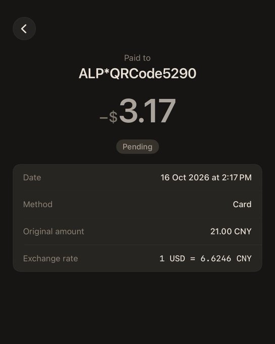 A mobile payment confirmation screen showing a pending payment of -$3.17 to 'ALP*QRCode5290', with the original amount of 21.00 CNY at an exchange rate of 1 USD = 6.6246 CNY on 16 Oct 2026.