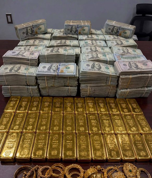 The image shows large stacks of $100 U.S. currency bills, numerous gold bars marked "FINE GOLD 1 KILO 999.9," and gold jewelry/necklaces arranged on a table. This appears to be a classic scam post using imagery of cash and gold to lure viewers into sharing their Solana wallet addresses under the false pretense of receiving crypto "giveaways" or rewards.