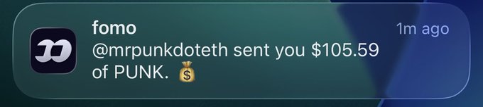 A mobile notification from the 'fomo' app stating '@mrpunkdoteh sent you $105.59 of PUNK' from 1 minute ago.