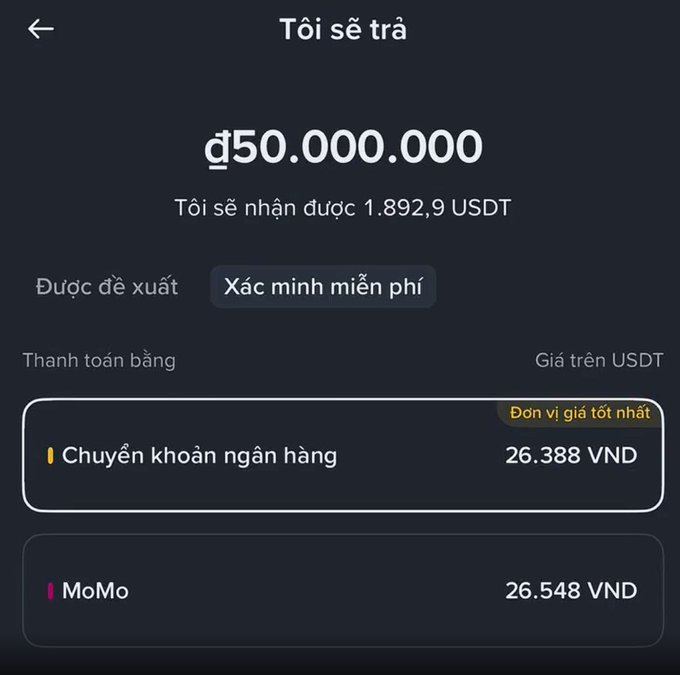 A cryptocurrency exchange screen in Vietnamese showing 'Tôi sẽ trả đ50.000.000' and payment options including 'Chuyển khoản ngân hàng' at 26,388 VND and MoMo at 26,548 VND.