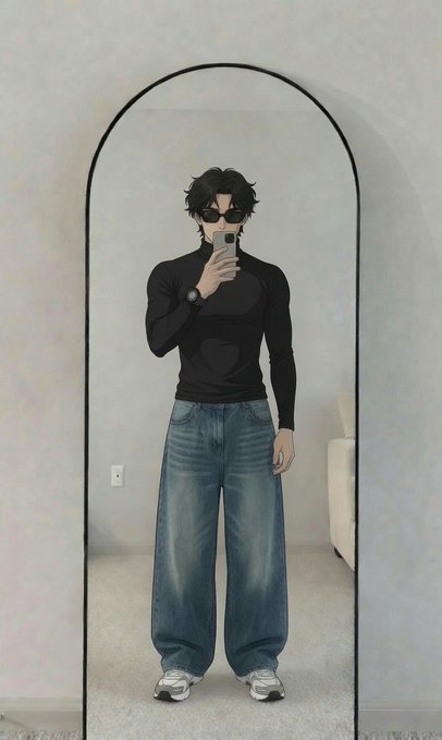 A young person with dark hair and sunglasses takes a mirror selfie with their phone, wearing a black turtleneck, baggy blue jeans, and sneakers, standing in front of a tall arched mirror.