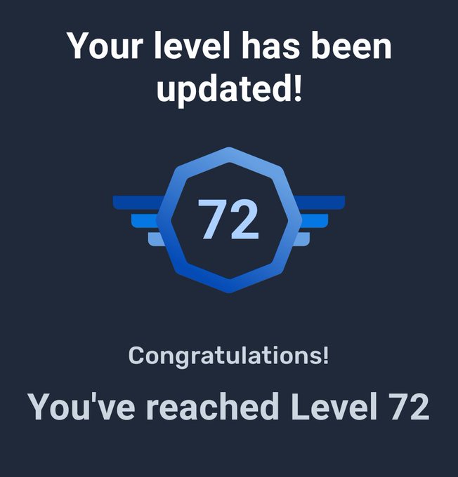 A dark blue digital notification screen reading 'Your level has been updated! Congratulations! You've reached Level 72' with a winged badge design.