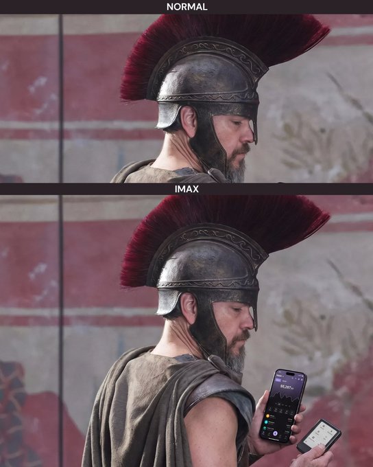 A meme showing a Spartan warrior in profile twice—once labeled "NORMAL" with nothing in his hand, and once labeled "IMAX" where he holds a smartphone displaying "$6,397+" and a card reader, humorously illustrating how IMAX tickets are so expensive you have to pay the premium price just to see the movie. The joke ties into the post about splurging on IMAX by showing the literal "bigger picture" (the larger phone screen/ticket price) that comes with the upgraded experience.
