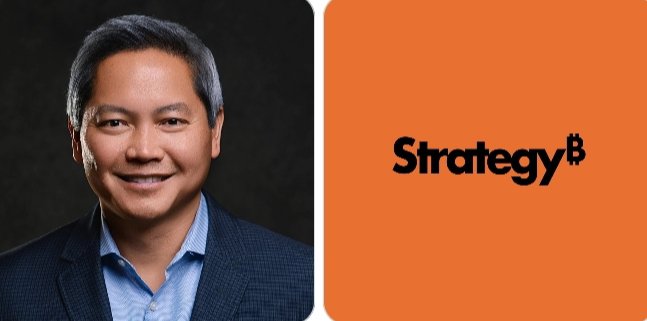 The image shows a smiling man in a dark suit jacket and light blue shirt on the left, alongside the "StrategyB" logo on an orange background on the right. The image relates to the post by featuring Strategy's branding alongside Phong Le, Strategy's CEO who is referenced as calling the company the "central bank of Bitcoin."