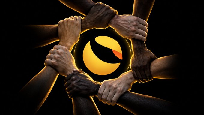 Digital artwork showing multiple hands of varying skin tones clasped together in a circle around a glowing yellow and orange eye-like logo against a black background.