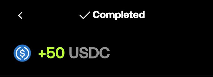 A dark screenshot showing a completed transaction confirmation with a checkmark and the text "Completed" above a USDC coin icon and "+50 USDC" in green.