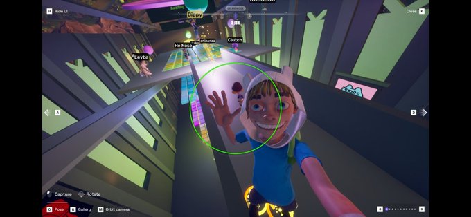 A screenshot from the multiplayer game "Crab Game" showing first-person gameplay in a colorful level with multiple players visible, including usernames like "Drippy," "Clutch," "Layba," and others, with camera controls overlay.