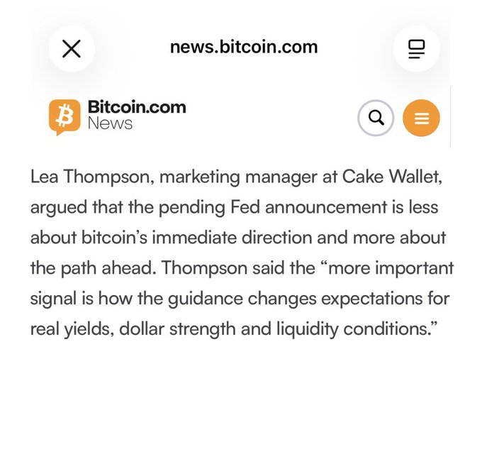 A screenshot of a news.bitcoin.com article quoting Lea Thompson, marketing manager at Cake Wallet, discussing how the upcoming Fed announcement will affect expectations for real yields, dollar strength, and liquidity conditions rather than bitcoin's immediate direction.