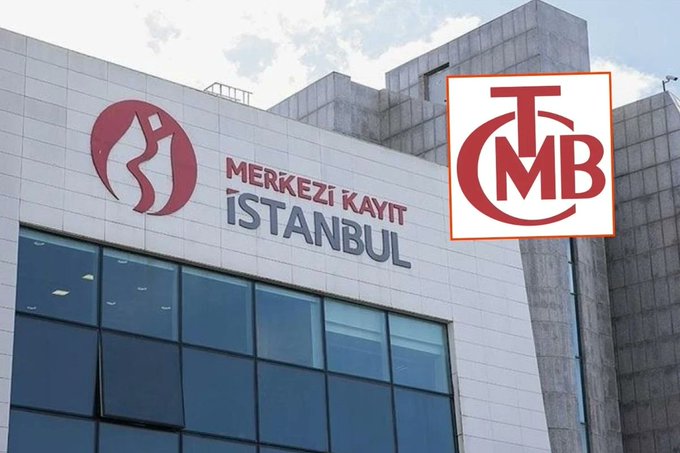 Exterior of a building displaying the 'Merkezi Kayıt İstanbul' (Central Registry Istanbul) sign and logo, with a red 'TMB' logo overlaid in the upper right corner.