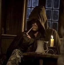 A hooded, cloaked figure sits alone in a dimly lit, candlelit medieval tavern, smoking a pipe next to a tankard of ale. The mysterious, shadowy scene mirrors the post's tone of a clandestine revelation, as if the patron guards the secret news of Solana's long-awaited disinflation approval.