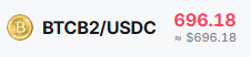 A financial ticker showing the BTCB2/USDC trading pair with a price of 696.18.