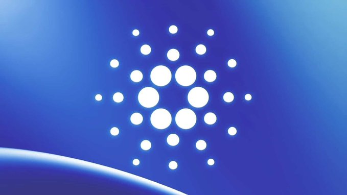 The image displays the Cardano (ADA) logo, featuring its signature pattern of white dots arranged in a circular, geometric design against a vibrant blue gradient background. This logo represents the cryptocurrency that DZ BANK has added to its meinKrypto trading service, marking a significant milestone for Cardano's accessibility through regulated German banking channels.