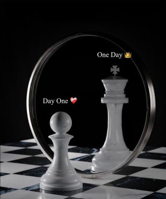A chess piece seen in a mirror appears as a king (labeled 'One Day 👑'), while in front of the mirror it's a pawn (labeled 'Day One ❤️'), representing ambition and potential transformation.