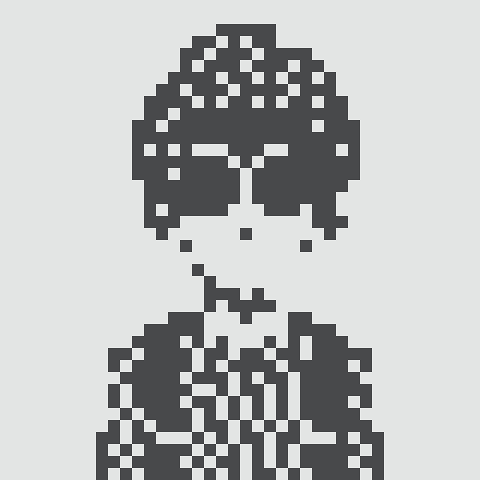 A pixel art portrait of a person with short, curly hair, glasses, and a patterned shirt, rendered in dark blue and white blocks.
