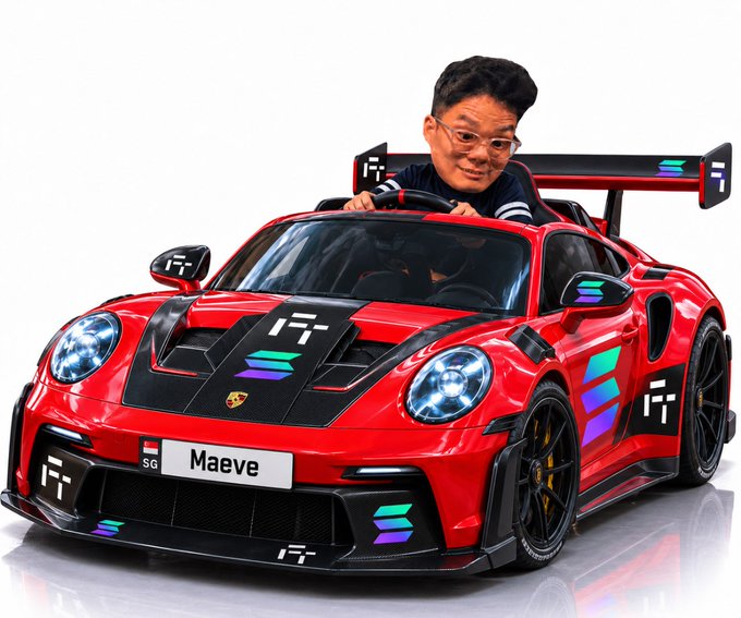 A person wearing glasses is digitally composited into the driver's seat of a red Porsche with a custom license plate reading 'Maeve' and colorful racing decals.