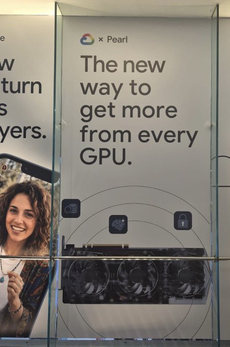 The image features a white poster with black text displayed, containing information about a new way to get more gamers from every GPU using Google Cloud services. A woman wearing a pink shirt is shown next to the poster, smiling at her phone screen. The poster also mentions that the company will be going into Taiwan soon.