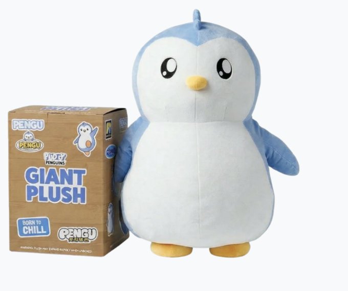 A product photo of a Pengu (Pudgy Penguins) Giant Plush toy next to its brown packaging box labeled "GIANT PLUSH" and "BORN TO CHILL."