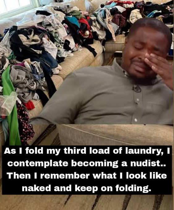 A man sits surrounded by massive piles of unfolded laundry on a couch, with text reading: 'As I fold my third load of laundry, I contemplate becoming a nudist.. Then I remember what I look like naked and keep on folding.'