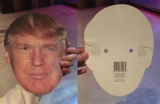 A split image showing a Donald Trump face mask held by its ear loops; the left side shows the printed face, while the right side shows the white cardboard packaging back featuring a barcode labeled '0 896087 965504'.