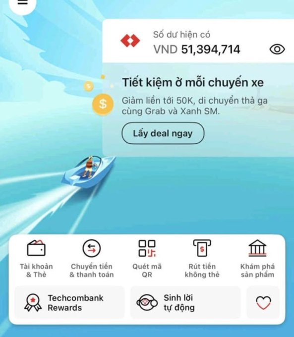 Vietnamese mobile banking app screen showing account balance of VND 51,394,714 with a promotional offer for ride savings and menu options including Techcombank Rewards.