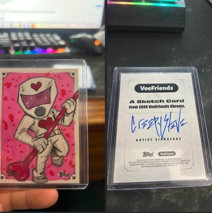 Two views of a VeeFriends sketch card from the 2026 VeeFriends Chrome set, showing a character in a hazmat suit with a heart on a pink card and the artist's signature on the back.