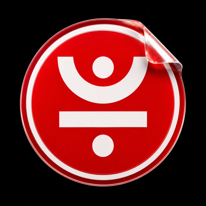 A red circular sticker with a peeling corner displays a white smiley-face design featuring a curved smile, a dot, a horizontal bar, and another dot, resembling the SteelSeries logo.