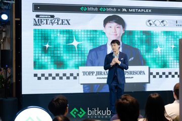A man in a suit stands at a podium on stage at the Indonesia Metaplex event, with his image displayed on a large screen behind him branded with 'bitkub' and 'METAPLEX' logos, captioned 'TOPP...IRSOPA FOUNDER'.