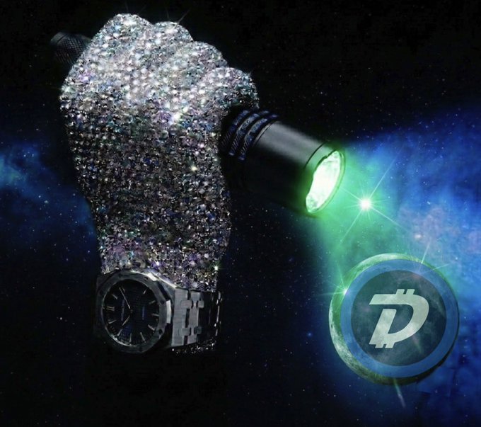 A glittery, diamond-encrusted fist holds a glowing green flashlight illuminating the DigiByte (DGB) logo against a cosmic blue background, while wearing a luxury watch—symbolizing the path ("the way") to financial prosperity through the DigiDollar crypto.
