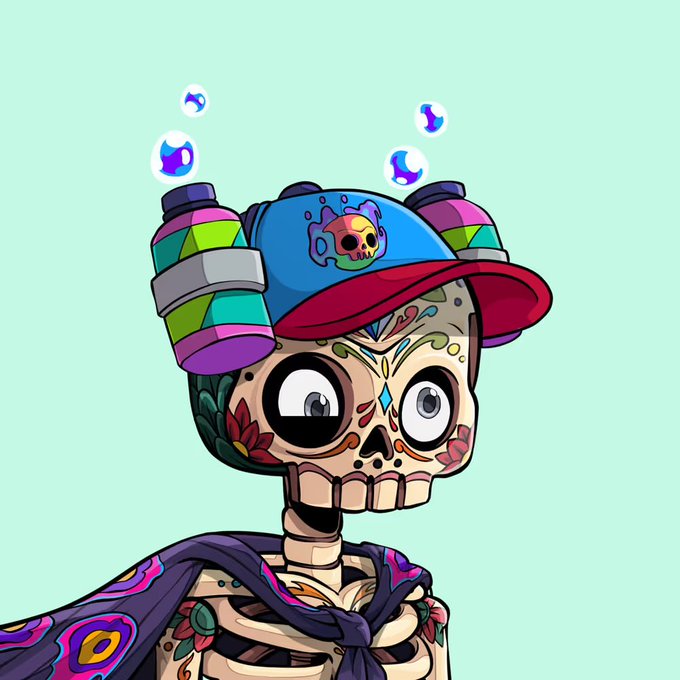 A colorful cartoon illustration of a sugar skull-style skeleton character wearing a blue and red baseball cap with a skull logo, headphones, and a purple patterned scarf against a light teal background.