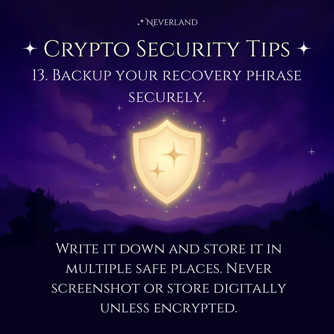 A purple-themed crypto security tip graphic featuring a glowing shield, with text 'NEVERLAND CRYPTO SECURITY TIPS 13. Backup your recovery phrase securely. Write it down and store it in multiple safe places. Never screenshot or store digitally unless encrypted.'