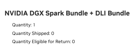The image displays an order status for "NVIDIA DGX Spark Bundle + DLI Bundle" showing a quantity of 1 ordered with 0 shipped and 0 eligible for return. This appears to show a tracking or order record for high-end NVIDIA AI hardware, likely shared to illustrate progress toward building a Deepseek v4f replica cluster for increased concurrency in scanning workflows, as mentioned in the post jokingly questioning whether they're becoming an AI company.