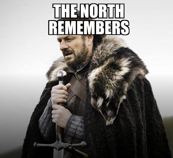 A meme featuring Ned Stark from Game of Thrones in his fur cloak holding a sword, with the text 'THE NORTH REMEMBERS' at the top.