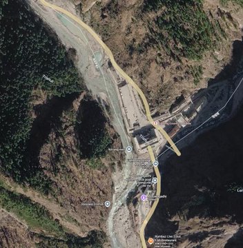 A satellite view shows a border port area with several location markers, including "Zhangmu Port," "Zhangmu Port Inspection Building," and "Rongxia Lake Level." The image relates to the post by depicting the China-Nepal border crossing where Binance is reportedly hosting an event, contextualizing the message's well-wishes for safety at this sensitive international location.