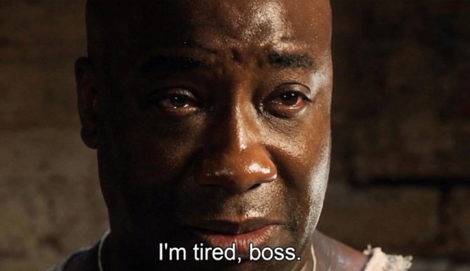 A close-up shows a weary Black man with tears welling in his eyes, with the subtitle "I'm tired, boss." The image visually evokes exhaustion and emotional strain, resonating with a post tagged $DOT that likely references Polkadot cryptocurrency amid apparent market fatigue.
