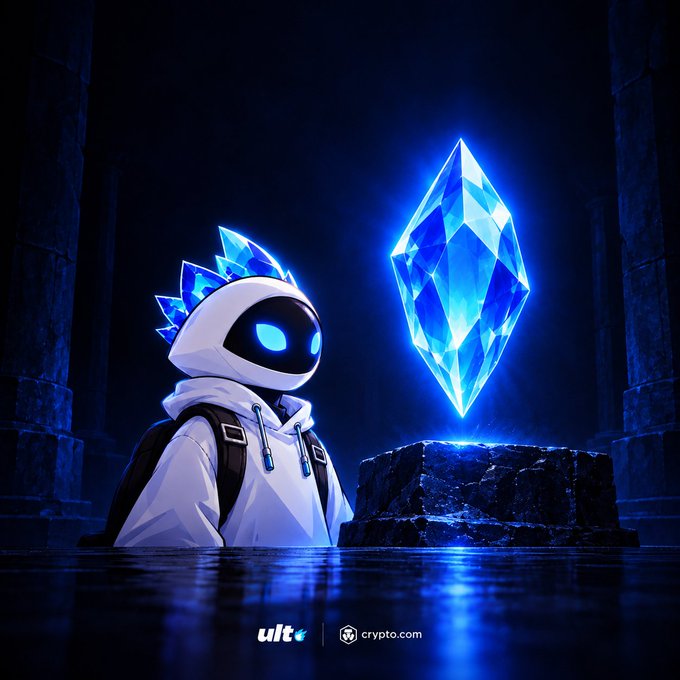 A stylized illustration featuring a hooded character with glowing blue eyes next to a large glowing blue crystal on a stone pedestal, with "ult" and "crypto.com" logos at the bottom.