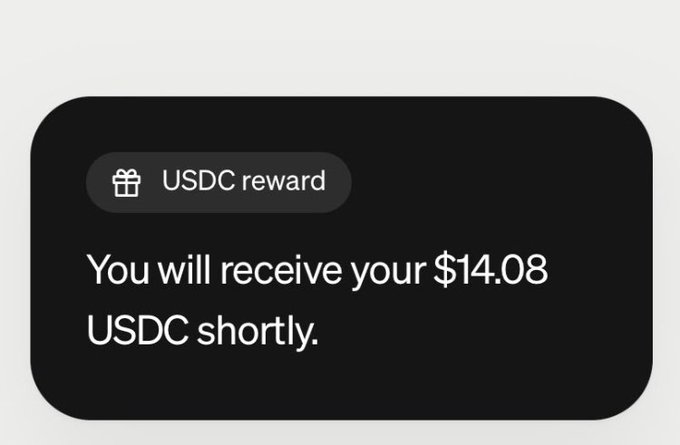 A digital notification stating 'USDC reward' with the message 'You will receive your $14.08 USDC shortly.'