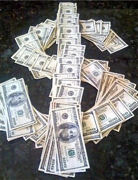 A large spread of U.S. $100 bills fanned out on a dark surface, symbolizing the massive wealth gains crypto investors hope to achieve if XRP hits one of the ambitious price targets ($10, $50, $100, or $500) posed in the poll. The abundance of cash visually reinforces the bullish sentiment and profit potential tied to the #XRP community's speculation.
