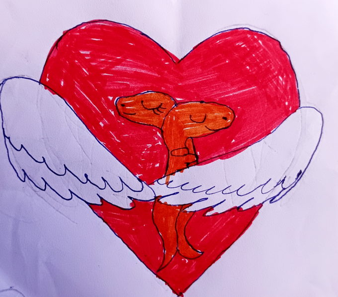 A child's hand-drawn illustration featuring a red heart with white angel wings, containing a small orange creature with a smiling face inside.