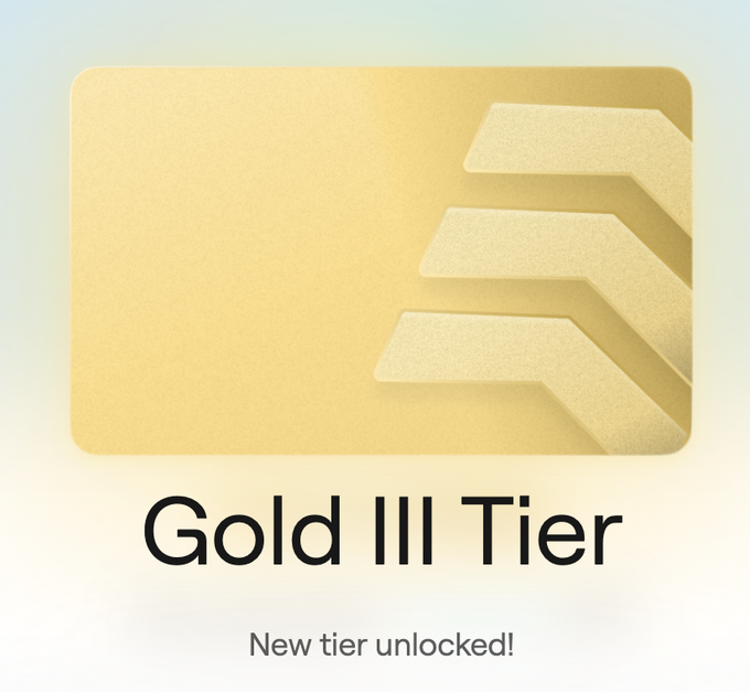 A 'Gold III Tier' achievement card with gold chevron stripes indicating a newly unlocked tier.