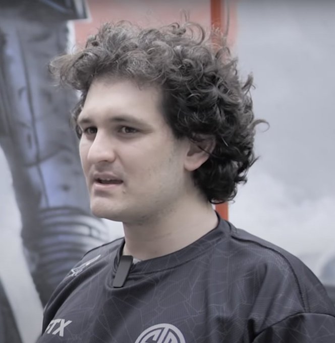 The image features a man with curly hair wearing a black shirt, possibly a soccer jersey or a similar outfit. The man appears to be looking off into the distance, giving the impression that he's lost in thought or deep contemplation. There are no texts or other objects visible in the image, and the focus is solely on the man and his surroundings.

The post reads "BREAKING: Sam Bankman-Fried has lost his appeal to overturn his FTX fraud conviction." This statement seems unrelated to the main subject of the image - the man with curly hair wearing a black shirt. The connection between these two elements is unclear, as they are not directly related and do not seem to have any common context or theme in the image itself.
