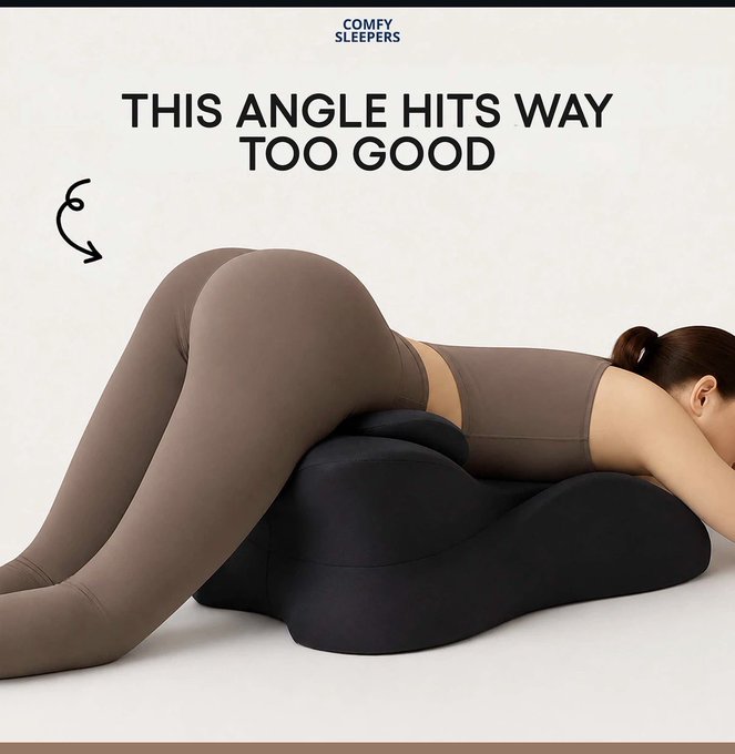Advertisement for COMFY SLEEPERS showing a woman in brown activewear lying on a black contoured pillow with text reading "THIS ANGLE HITS WAY TOO GOOD".